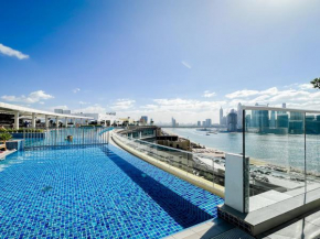 Luxe Lagoon Suites Palm Beach Private Access with Infinity Pool & Bar